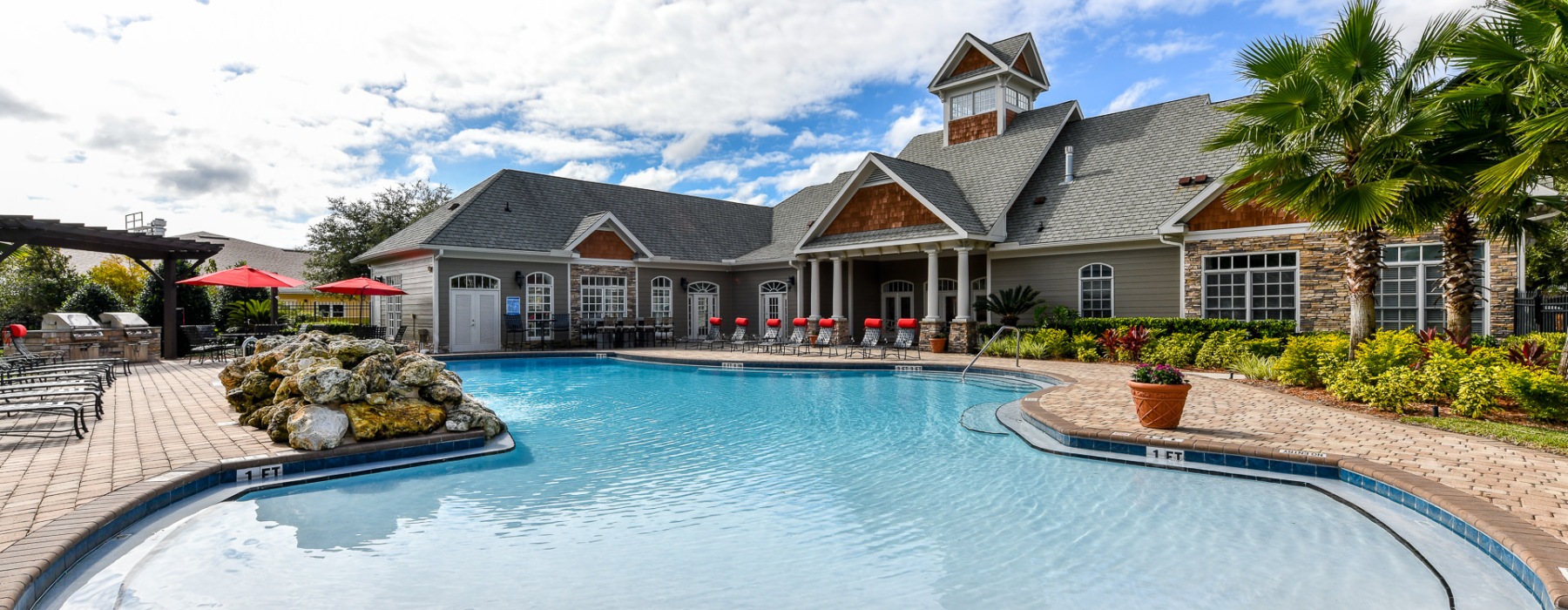 a pool in front of a building